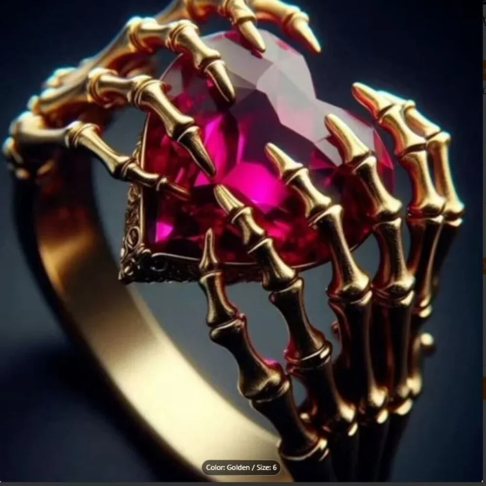 18K Gold Skeleton Hands Holding a Heart Cut Garnet Statement Ring Band